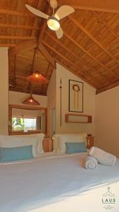 Postel nebo postele na pokoji v ubytování LAUS Bangalôs Experience - Piscina Privativa - Praia de Algodões - Península de Maraú - Bahia