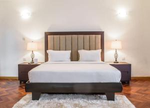 Letto o letti in una camera di Pier Harbour Residences and Spa