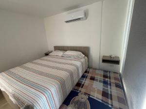 Postel nebo postele na pokoji v ubytování Suite Nueva Salinas-Chipipe