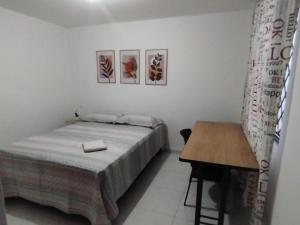 Katil atau katil-katil dalam bilik di El Hogar de Ami