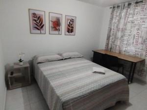 Katil atau katil-katil dalam bilik di El Hogar de Ami