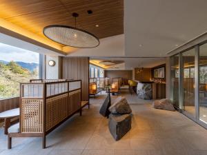 a lobby with a view of the mountains at Fufu Hakone in Hakone