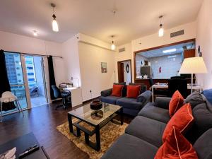Posezení v ubytování Sea View 1BR apartment - Marina Pinnacle