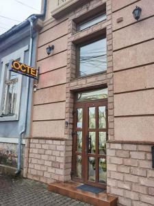 a door on the side of a building at Солензара in Mukacheve