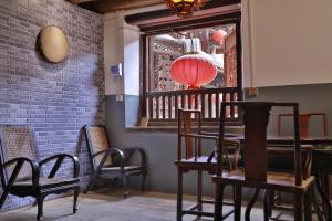 Зона вітальні в Tulou Fuyulou Changdi Inn