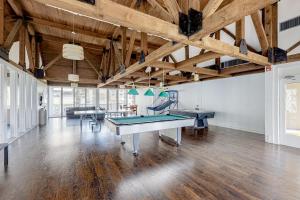 a large room with a ping pong table in it at Gulf Point Condominiums #1314 in South Padre Island