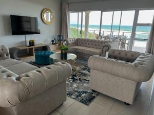 Χώρος καθιστικού στο Sapphire Views Self-Catering Luxury Apartments