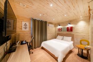 TV a/nebo společenská místnost v ubytování Laria Hotel