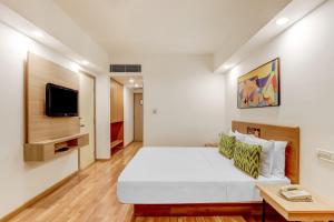 Katil atau katil-katil dalam bilik di Lemon Tree Hotel, Ahmedabad