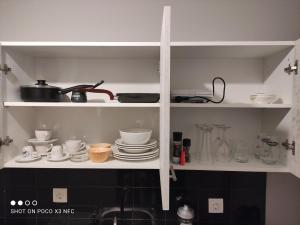 A kitchen or kitchenette at Closer "Egnatia Apartment 4"
