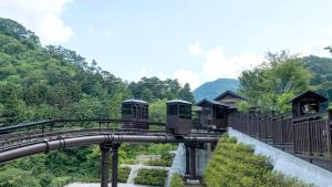 Zahrada ubytování Shionoyu Onsen Rengetsu + 37 fotografií