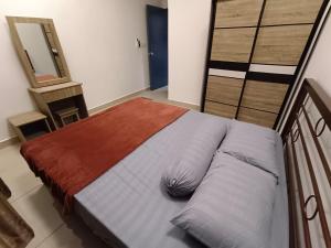 Katil atau katil-katil dalam bilik di Gharoda Kajang Homestay