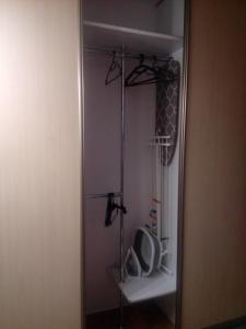 a bathroom with a shower with a toilet in it at Leśny Loft in Gdynia