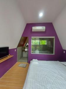 Postel nebo postele na pokoji v ubytování Homestay Nam Hàm Luông