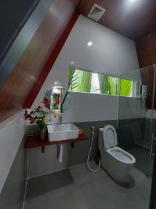 Koupelna v ubytování Homestay Nam Hàm Luông