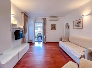 Et tv og/eller underholdning på Bel quadrilocale con terrazza nel centro storico