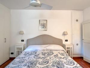 En eller flere senge i et værelse på Bel quadrilocale con terrazza nel centro storico