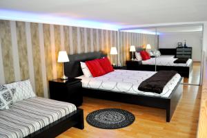 Posteľ alebo postele v izbe v ubytovaní Welcome Budapest Apartments