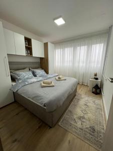 Postel nebo postele na pokoji v ubytování Wolf Apartment Zagreb