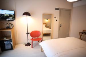 Mare House Boutique Hotelにあるベッド