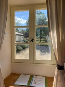 Balkón nebo terasa v ubytování Le Bas Chesnay Gîte Domfront en Poiraie