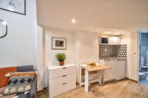 Kuchyňa alebo kuchynka v ubytovaní Bel appartement au coeur de Montmartre