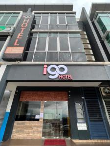 a building with the olympics sign on it at I Go Inn in Bandar Saujana Putra
