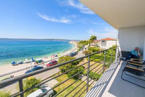 A balcony or terrace at Stunning beachfront apartment with roof terrace