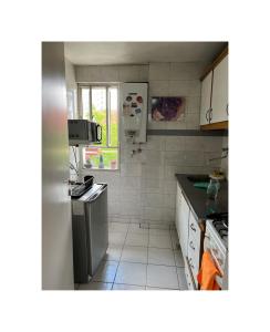 Una cocina o kitchenette en Tucumán Suite Departamento equipado con excelente ubicación