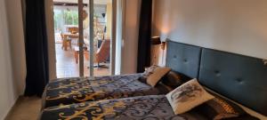 Posteľ alebo postele v izbe v ubytovaní Casa Rural Buenavista Pedralba