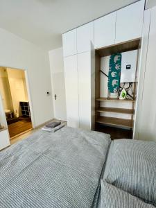 A bed or beds in a room at Apartmán Liptov NP9