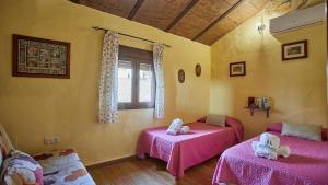 Posteľ alebo postele v izbe v ubytovaní Casa Los Olivos Prado del Rey by Ruralidays + 29 fotografií