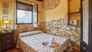 Postel nebo postele na pokoji v ubytování Casa Los Olivos Prado del Rey by Ruralidays