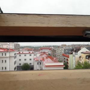 a view of a city from a window at Apartments Křišťanova in Prague
