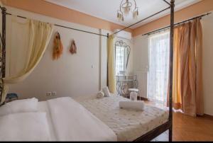 Ένα ή περισσότερα κρεβάτια σε δωμάτιο στο Nea Smirni Luxury Apartment