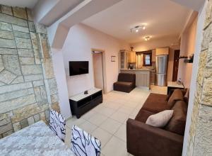 Et tv og/eller underholdning på Loukia's Studios and Apartments