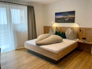 Postel nebo postele na pokoji v ubytování Apart Spitaler Brandberg