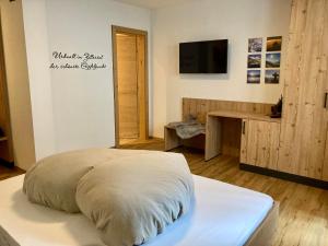 Postel nebo postele na pokoji v ubytování Apart Spitaler Brandberg