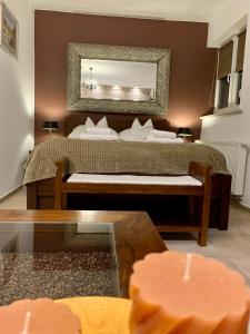 Posteľ alebo postele v izbe v ubytovaní Apartament Kawowy