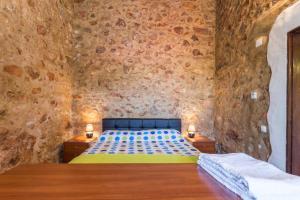 Lova arba lovos apgyvendinimo įstaigoje Casa Bi Rosario - Quinta Amoreira