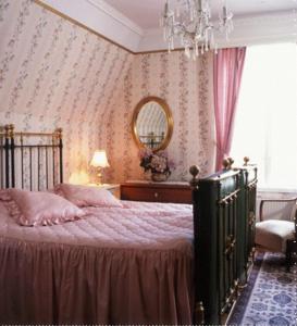 Llit o llits en una habitació de Solvikens Pensionat