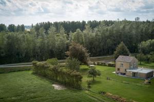 an aerial view of a house in a field at Polderhuys De Veerhoek in Oostburg