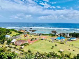 an aerial view of a park next to the ocean at AZ Hotel - Vacation STAY 56058v in Akaoki