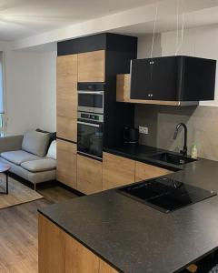 Virtuvė arba virtuvėlė apgyvendinimo įstaigoje Bel Appartement CV