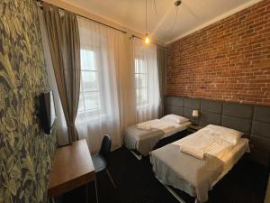 Posteľ alebo postele v izbe v ubytovaní Boogie ApartHouse Old Town