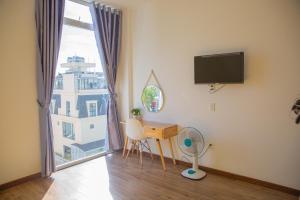 TV a/nebo společenská místnost v ubytování Duy Thanh hotel