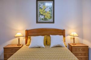 A bed or beds in a room at Apartamento en el centro de Portosin