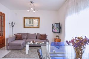 A seating area at Apartamento en el centro de Portosin