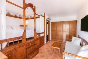Aegean Village Beachfront Resort客房内的一张或多张床位