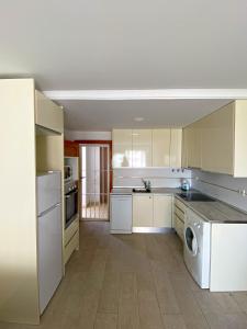 Kuchyň nebo kuchyňský kout v ubytování Apartamento Moderno Cerca de la Playa - Residencial AguaViva